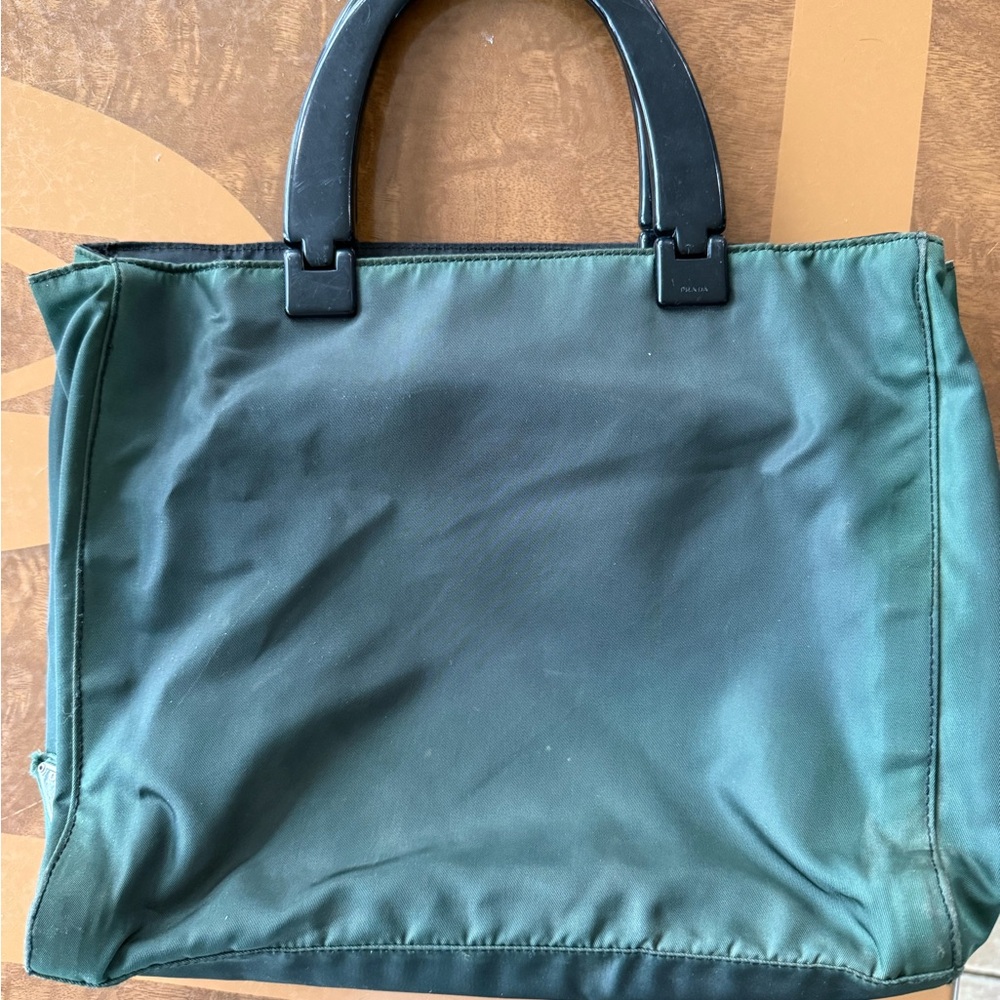 Authentic Prada, Vintage, late 90. Green nylon with plexiglass handles.